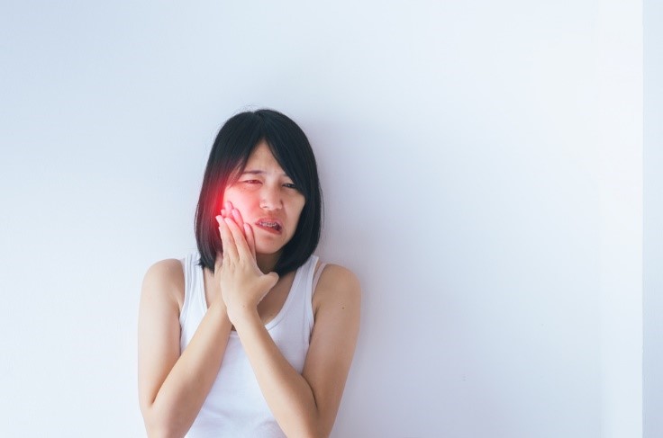 Woman with Toothache